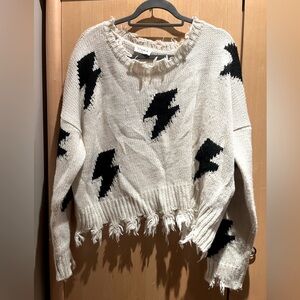 Storia Black and White Distressed Lightning Sweater